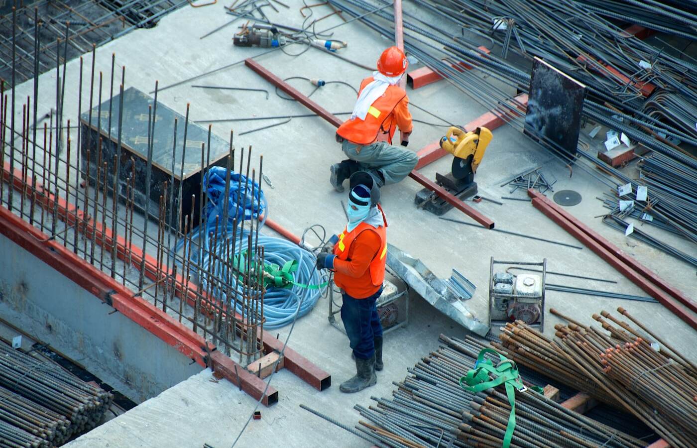 Active construction site with materials on the ground