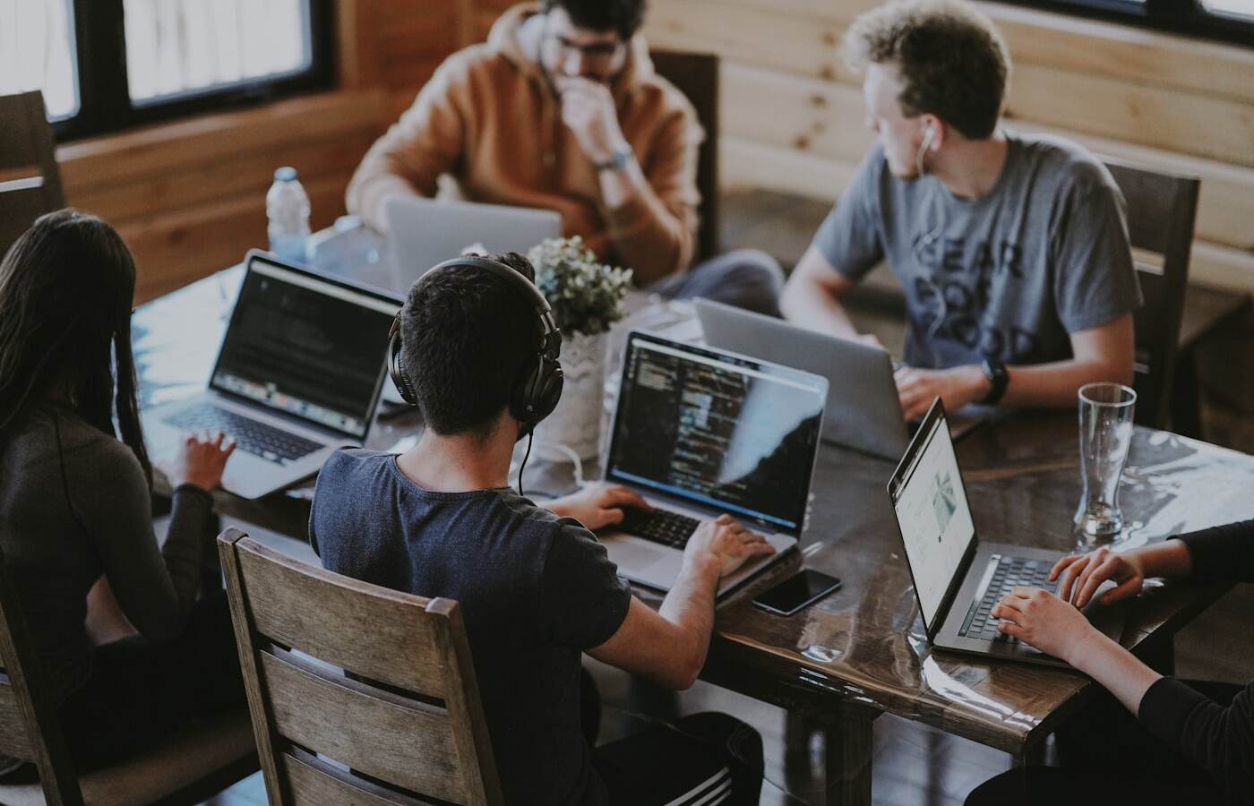 Team reviewing notes at a desk